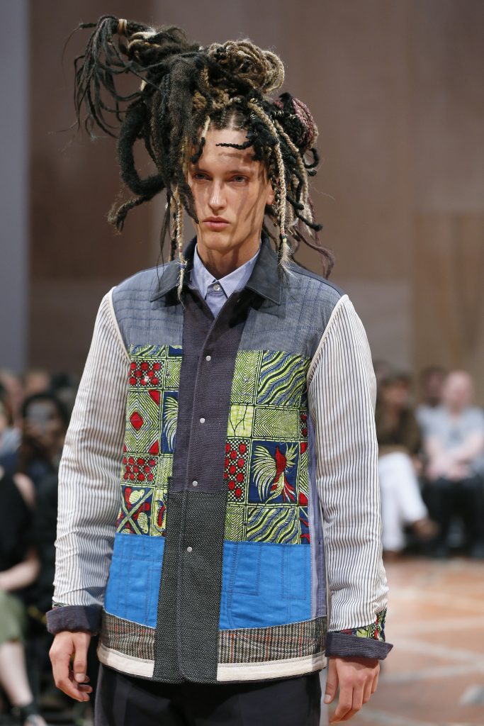 A model presents a creation by Japanese designer Junya Watanabe during the men's Spring Summer collection fashion shows in Paris on June 26, 2015. AFP PHOTO / PATRICK KOVARIK / AFP PHOTO / PATRICK KOVARIK